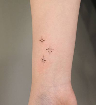 Shoot Star Tattoo, Star Tattoos Forearm, Star Shine Tattoo, Three Small Stars Tattoo, Moon And Three Stars Tattoo, Magic Stars Tattoo, Memorial Star Tattoos, 3 Star Tattoo Designs, Stars Tattoo On Wrist