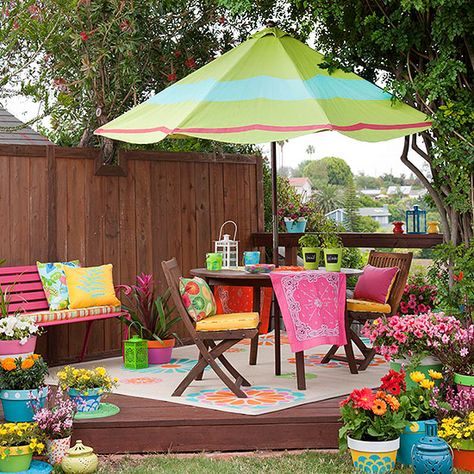 Color Your World in a shady yard by adding colorful pops of color with pillows, outdoor rug and umbrella. Ideas Terraza, Colorful Patio, Backyard Living, Backyard Makeover, Colorful Garden, Colorful Furniture, Small Gardens, Outdoor Oasis, Outdoor Rooms