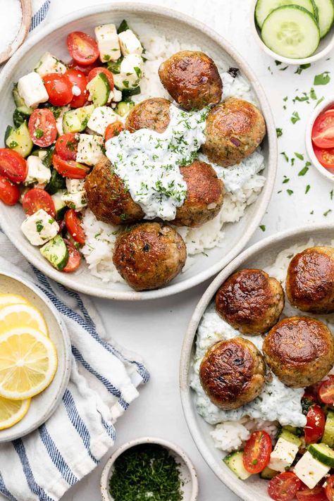 If you want to enjoy the delicious and healthy flavors of the Mediterranean, try making some Greek turkey meatballs! This recipe is absolutely delicious and really easy to make. Served up with a homemade tzatziki sauce, this meal is perfect for meal prep bowls or salads. Greek Turkey Meatballs With Tzatziki Sauce, Tzatziki Meal Ideas, Mediterranean Turkey Bowl, Mediterranean Meatball Bowl, Greek Turkey Meatball Bowls, Greek Meal Prep Bowls, Meal Prep Meatballs, Greek Meatballs With Tzatziki Sauce, Greek Buffet