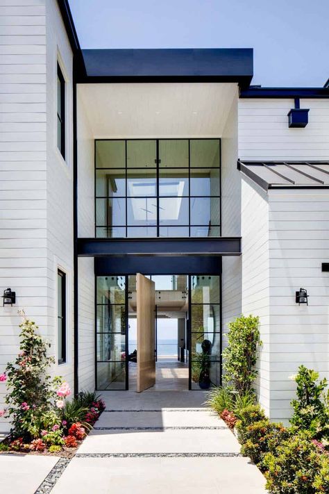 Coastal contemporary home with indoor/outdoor living in Southern California Brandon Architects, Beach House Exterior, Traditional Cottage, Coastal Contemporary, Coastal Modern, Pivot Doors, Natural Ventilation, House Architecture, Open Layout