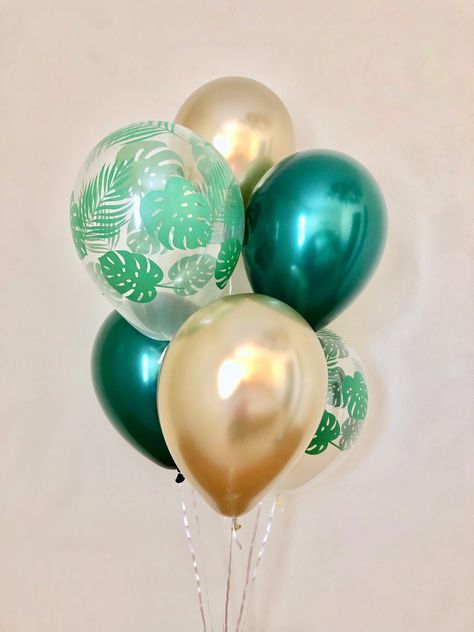 "Welcome to Sweet Escapes By Debbie This listing is for 2 forest green, 2 chrome gold, 2 clear with green leaves 11\" latex balloons. ~ Balloons ship flat & deflated ~ The balloons arrive in a flat package they need to be inflated. For helium you can take them to your local party store or supermarket and they can fill for a nominal fee (they will include a ribbon). If it is air filled it will NOT float. ~Balloons should not be overfilled as they may pop." Tropical Birthday Party, Tropical Party Decorations, Aloha Party, Balloon Garland Diy, Fiesta Tropical, Tropical Birthday, Green Chrome, Jungle Party, Hawaiian Party