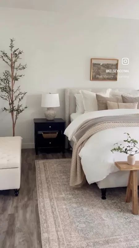 Master Bedrooms With White Dresser, Black Cream Rug Living Room, Natural Bedroom With Black Accents, White Headboard With Black Nightstands, Apartment Bedroom Dark Furniture, White Bed Dark Furniture, Bedroom Decor White Headboard, White Black Neutral Bedroom, White Tan Black Bedroom