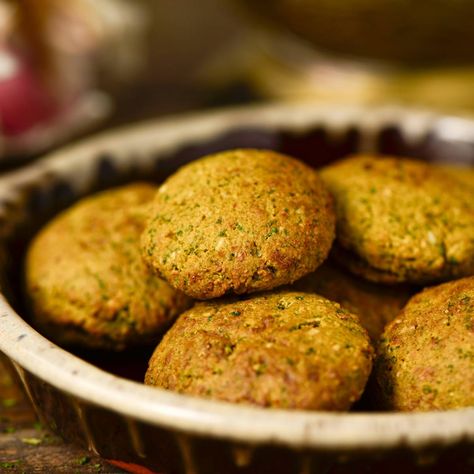 The reason this recipe seems similar to falafel is that the latter and better-known dish is a direct descendent of this Egyptian fritter. Tamiya’s roots stretch back to ancient Egypt. Over the centuries, it was lightened in texture, the spices varied, and milder-flavored chickpeas frequently s... Egyptian Food Recipes, Bean Fritters, Fritters Recipes, Flavored Chickpeas, Food Recipes Vegetarian, Middle East Food, Fava Bean, Egyptian Food, Fritter Recipes