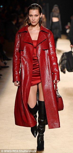 Red-y to go! Bella Hadid looked sensational in a striking satin mini dress teamed with a p... Trench Coat Runway, Crocodile Outfit, Red Trench Coat Outfit, 2025 Predictions, Bella Hadid Looks, Patent Trench Coats, Crocodile Fashion, Colour Mood, Trench Outfit