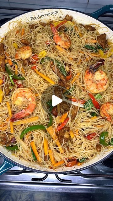 Remrem | The Foodie on Instagram: "Singapore Noodles Recipe 

This meal is a good treat, you should make it soon. 

Ingredients 
Rice sticks (vermicelli)
Chicken breast 
Fresh prawns
Carrots 
Yellow, green & red bell peppers 
Red scotch bonnet 
Spring onions 
Onion
Garlic
Ginger
Curry powder 
Soy sauce 
Sesame oil
Stock cube 
Salt

#singaporenoodles #ricenoodles #ricesticks #singaporenoodlesrecipe #dinner #dinnerideas #dinnerinspiration #recipereels #foodporn #foodblogfeed #goodfood #recipeoftheday" Singapore Noodles Recipe, Rice Sticks, Vermicelli Recipes, Singapore Noodles, Red Bell Peppers, Rice Vermicelli, Scotch Bonnet, Noodles Recipe, Spring Onions