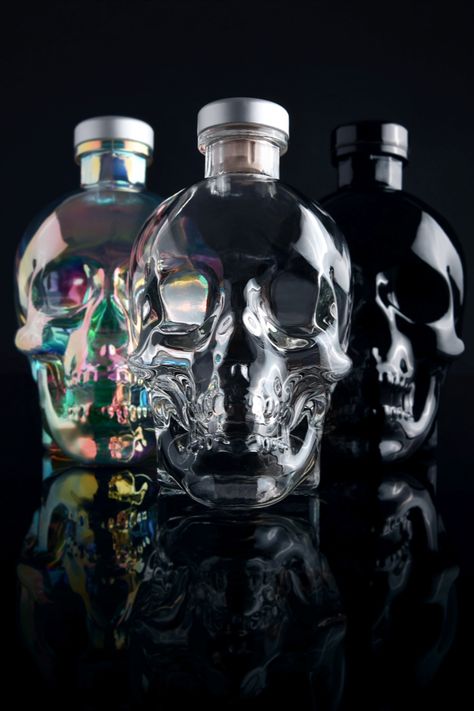 The three Crystal Head expressions: Crystal Head Vodka, crafted from Canadian corn. Crystal Head Aurora, crafted from English wheat. Crystal Head Onyx, crafted from Blue Weber agave. Crystal Head Vodka, Premium Vodka, Drinks Alcohol, Liquor Bottle, Citrus Oil, Liquor Bottles, Our Story, Product Photography, Sugar Skull