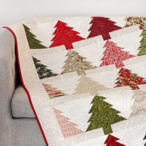 National Sew a Jelly Roll Day: Get Rolling on Your Next Favorite Quilt - The Jolly Jabber Quilting Blog Christmas Tree Quilt Block Patterns Missouri Star Quilt, Jelly Roll Christmas Tree Quilt Patterns, Quilts With Jelly Rolls, Christmas Jelly Roll Quilt Patterns Free, Christmas Lap Quilts Free Pattern, Jelly Roll Quilt Patterns Free Ideas, Christmas Jelly Roll Quilt Patterns, Jelly Roll Christmas Quilt Patterns, Quilt Designs Patterns