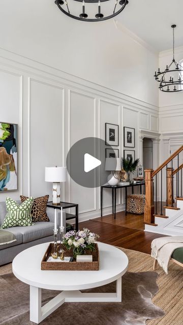 Erika Ward Interiors on Instagram: "Tall ceilings can be intimidating if you’ve got a big blank wall staring you in the face. We transformed this room with stunning trim moldings! 🌟 These timeless details elevate any room, adding classic elegance and boosting your home’s resale value. Invest in style that lasts! 🏡✨ #HomeDecor #TimelessDesign #TrimMoldings #HomeImprovement #ErikaWardInteriors" Vaulted Ceiling Wainscoting, Picture Frame Molding Vaulted Ceiling, Vaulted Ceiling Trim, Tall Accent Wall High Ceilings, Tall Wainscoting, Waynes Coating, Tennessee House, Big Blank Wall, Ceiling Trim