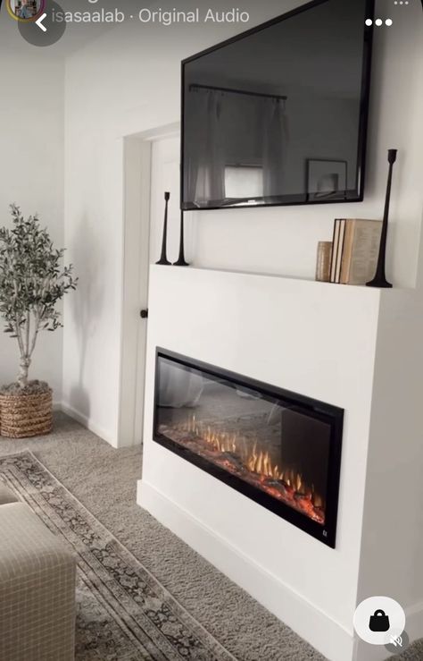 Master Bedrooms Electric Fireplace, Electric Fireplace With Ledge, Small Bedroom With Electric Fireplace, Tv And Fire Wall Ideas Bedroom, Corner Electric Fireplace Modern, Bedroom Electric Fireplace Ideas With Tv, Minimal Electric Fireplace, 77 Inch Tv Living Room, Minimalist Fireplace With Tv