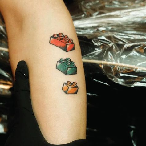 3 Simple Red Green Orange Color Lego Blocks Small Tattoo Idea & Design on Arm 3 Color Lego Blocks Tattoo Done At Blocks Tattoo, Lego Blocks, Modern Tattoos, Hand Drawn Logo, Line Work Tattoo, Idea Design, Abstract Tattoo, Small Tattoo, Blackwork Tattoo