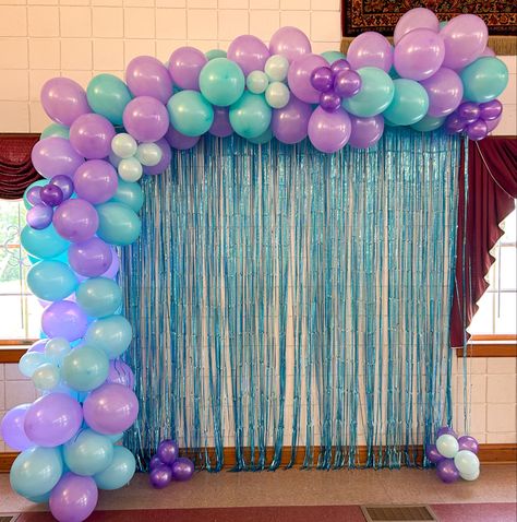 12ft. balloon garland with purple, teal, mint, and deep purple balloons topped off with a teal backdrop banner Pink Purple Teal Birthday Decorations, Teal Backdrop, Turquoise Party, Mermaid Birthday Party Decorations, Ariel Little Mermaid, Baby Backdrop, Mermaid Invitations, Purple Balloons, Sea Birthday Party