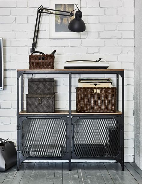 IKEA has living room ideas to help with your tech. An industrial style shelving unit like FJÄLLBO has solid pine shelves and metal mesh doors that let signals through. Put a basket on the top shelf to hold your remotes, too. Fjällbo Ikea, Bathroom Industrial Style, Ikea Industrial, Style Shelving, Bathroom Industrial, Industrial Style Bathroom, Ikea Living Room, Rustic Shelf, Organizing Storage