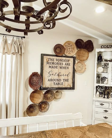 Boho Farmhouse Dining Room Wall Decor, Baskets Around Picture, Wall With Baskets And Pictures, Boho Western Dining Room Decor, Basket Wall With Sign, Wall Baskets Around Sign, Country Boho Home Living Room, Boho Farmhouse Kitchen Wall Decor, Basket Wall Farmhouse Style