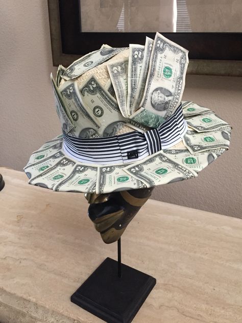 70th birthday money gift hat.  Made with 35 two dollar bills.  Used tape and glue dots to secure to hat. Money Hat Ideas, Money Gift For Men, Gift Money Ideas, Money Hat, Money Craft, Money Lei Diy, Money Birthday Cake, Money Gift Ideas, 2 Happy Birthday