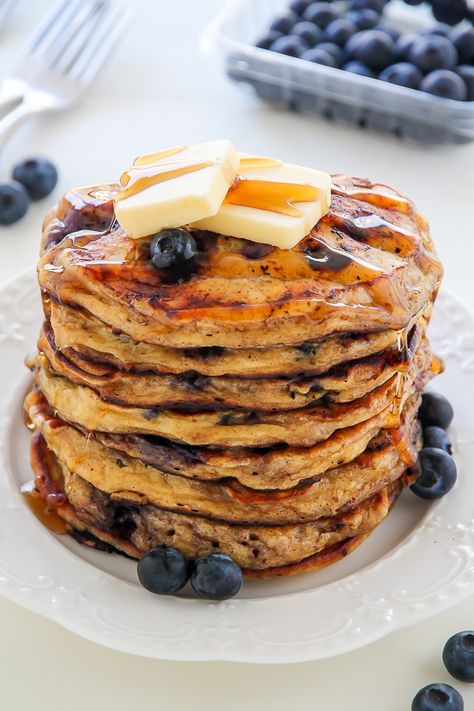 If you try this recipe, let me know! Leave a comment below and don’t forget to snap a pic and tag it #bakerbynature on instagram! Seeing your kitchen creations makes my day. Greek Yogurt Blueberry, Healthy Blueberry Pancakes, Fluffy Blueberry Pancakes, Fruit Pancakes, Greek Yogurt Pancakes, Baker By Nature, Yogurt Pancakes, Whole Wheat Pancakes, Wheat Pancakes