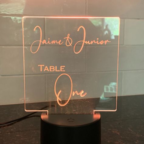 💍 Illuminate Your Reception with Custom LED Table Numbers! 💍 Laser-engraved acrylic wedding table number signs with multiple color LED bases – the perfect blend of elegance and modernity for your special day. ✨ ✨ Features: Personalized laser engraving Multiple color LED base Stylish and durable acrylic design Make your wedding reception unforgettable.🌟 #CustomWeddingDecor #CustomWeddingSigns #LightUpWeddingSigns #CustomWeddingTableNumbers #CustomWedding #PersonalizedWeddingSigns Wedding Table Number Signs, Table Number Signs, Laser Engraved Acrylic, Custom Wedding Decor, Number Signs, Acrylic Design, Custom Wedding Signs, Wedding Table Number, Acrylic Wedding