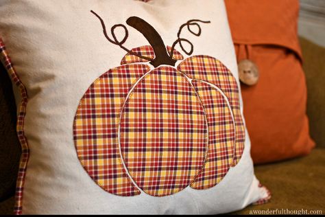 I couldn't bear to get rid of my favorite shirt that my boys wore when they were young, so I turned it into a cute plaid pumpkin pillow cover. Fall Sewing Projects, Plaid Pumpkin, Pumpkin Applique, Pumpkin Pillow, Fall Pillow, Fall Sewing, Fall Pillow Cover, Pumpkin Pillows, Fall Quilts