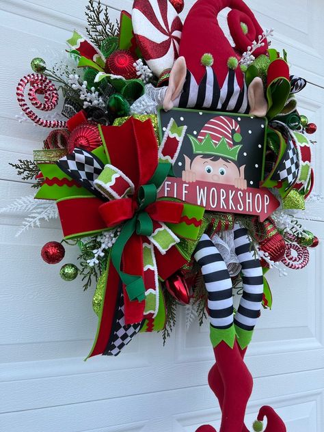 Whimsical Christmas Elf Wreath With Bows Elf Hat Elf Legs - Etsy Christmas Elf Decor Ideas, Diy Christmas Elf Decorations, Wreath Attachment Patterns, Elf Wreath Ideas Diy, Diy Christmas Elves, Holiday Porch Decorations, Elf Workshop, Whimsical Door, Elf Wreath