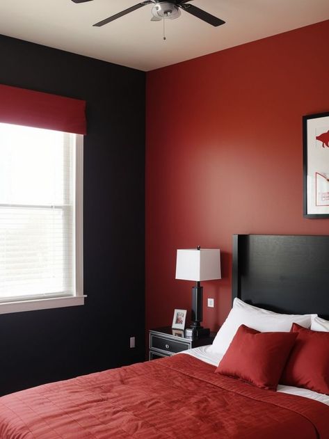 Create a bold statement in a boys bedroom with a vibrant red accent wall. Pair it with a sleek black bed frame and a sports-themed wall decal for an energetic and masculine vibe. Red Accent Wall Bedroom, Accent Walls Bedroom, Black Boy Room, Red Boys Bedroom, Bedroom Paint Design, Red Accent Wall, Feature Wall Bedroom, Black Bed Frame, Black Accent Walls