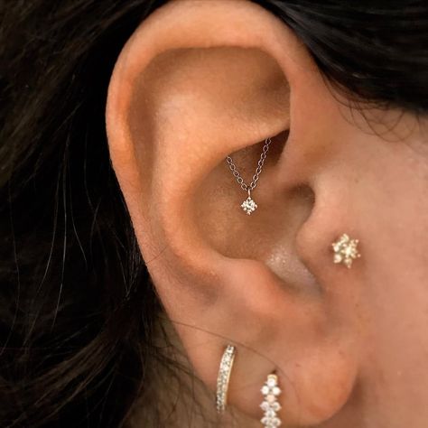 Our Diamond Drape Threaded Studs are like hidden gems, emerging mysteriously from the new Tash Helix℠ and Tash Hidden Rook℠ piercings. Hide Piercings, Maria Tash, Cute Piercings, Love My Body, Helix Piercing, Piercing Tattoo, Hidden Gems, Ear Piercings, Body Art