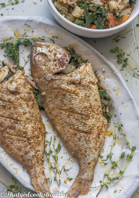 Caribbean Baked Fish with a side bowl of cooked vegetables. Parrot Fish Recipe, Fish Seasoning Recipe, Baked Fish Recipe, Whole Fish Recipes, Seared Fish, Cook Fish, Fish Recipes Baked, Parrot Fish, Whole Fish