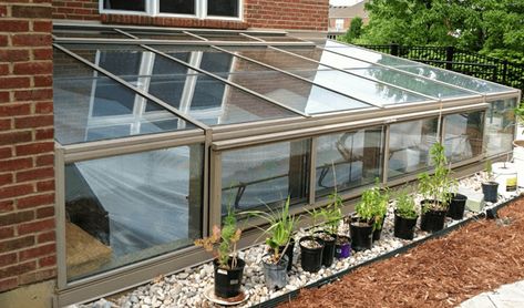 Pit greenhouses sit partially below the ground, which makes them extremely energy efficient, reducing energy costs and nurturing your plants year round. Conservatory Greenhouse, Build A Greenhouse, Polycarbonate Greenhouse, Home Greenhouse, Backyard Greenhouse, Small Greenhouse, Greenhouse Plans, Aquaponics System, Diy Greenhouse