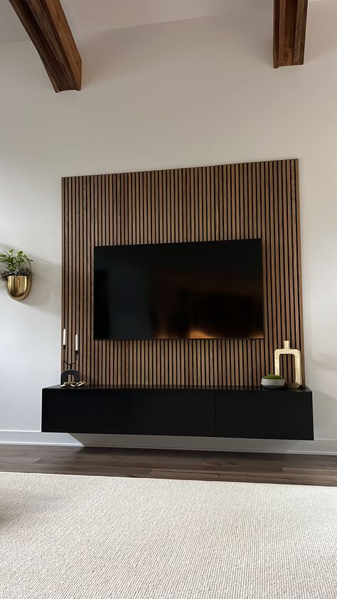 Tv Wall Asymmetrical, Wood Veneer Tv Wall, Wall Mounted Tv Panelling, Wood Slat Tv Wall Bedroom, Below Tv Ideas, Slotted Wood Accent Wall, Wooden Panel Living Room, Slatted Wall Tv Unit, Wood Panel Wall Behind Tv