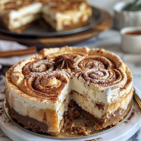 🍽️ Cinnamon Roll Cheesecake 🌟 Merge breakfast and dessert with our Cinnamon Roll Cheesecake! Perfectly sweet, perfectly spiced. #DessertTime 🛒 Ingredients: 2 cups cinnamon roll dough, chopped 16 oz cream cheese, softened 1 cup sugar 1 tsp vanilla extract 2 eggs 1/4 cup sour cream 1/4 cup white sugar 2 tsp cinnamon 👩‍🍳 Instructions: Base: Press chopped cinnamon roll dough into a pan as the crust. Filling: Beat cream cheese, sugar, vanilla, and eggs until smooth. Pour over crust. Swirl: Mix... Twist Recipes, Roll Cheesecake, Cinnamon Roll Cheesecake, Yummy Cheesecake, Cinnamon Roll Dough, Instagram Recipes, Twisted Recipes, Cinnamon Roll Cake, Easy Baking Recipes Desserts