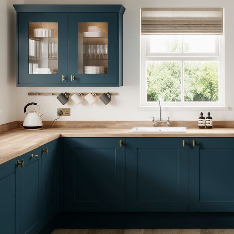 In need of blue kitchen inspiration or shaker kitchen inspiration? Our Chilcomb Paintable Marine Blue Kitchen is perfect for your blue kitchen ideas and modern kitchen ideas. The solid oak worktop, victorian tap and aged brass hardware are perfect for creating a traditional kitchen design. Add your favourite home decor and display cabinet ideas to create a rustic kitchen design. Marine Blue Kitchen, Display Cabinet Ideas, Shaker Kitchen Inspiration, Cupboard Colours, Howdens Chelford, Blue Kitchen Inspiration, Kitchen Cupboard Colours, Blue Kitchen Ideas, Cupboard Colors