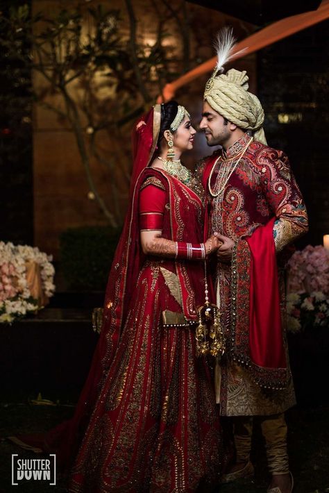 Photo of Traditional bride and groom in maroon outfits Marriage Poses, Poses Romantic, Bride Groom Photoshoot, Bride Groom Poses, Indian Wedding Poses, Bride Photos Poses, Groom Photoshoot, Photoshoot Couple, Indian Couple