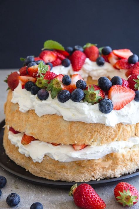 Homemade Angel Food Cake, a light delicious cake.  Perfect on its own or filled with some creamy whipped cream and fresh berries. A perfect red, white and blue cake for July 4th, or red and white cake for Canada Day using pantry staples! #angelfoodcake #cake #summerfruitcake #4thjulydessert #canadadaydessert #holidaydessert #pantrystaples #july4th Italian Lemon Cookies, Best Summer Desserts, Cake Light, Recipes Chocolate, Cake Vegan, Cake Recipes From Scratch, Lemon Cookies, Cookies Recipes, Angel Food Cake