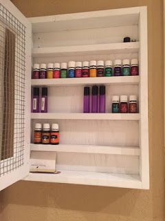 All Things Harrigan: DIY Essential Oil Storage Cabinet Essential Oil Storage Ideas Diy, Essential Oil Cabinet Storage, Hall Linen Closet, Essential Oils Medicine Cabinet, Essential Oil Shelves Diy, Essential Oil Wall Storage Diy, Shelves For Essential Oils, Essential Oil Storage Shelf, Essential Oil Starter Kit