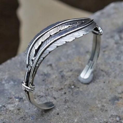 " Navajo bracelet DiscoverThe beauty of Navajo bracelet With This Sterling Silver Feather Jewelry. The Navajo bracelet This handcrafted piece featuresSterlingSilver in Feather Jewelry, making it a perfect blend of elegance andTradition. Materials SterlingSilver: High-quality and durable Design: Unique Feather Jewelry Sizes inside measurement: 5-1/4" with a 1-1/4" opening- fits wrist 6" to 6-1/2" Authentic Navajo bracelet Jewelry CelebrateThe rich heritage of Navajo bracelet artisans With This exquisite piece. Perfect for any occasion and a beautiful additionTo any jewelry collection. Why Choose Us? Spirit ofSanta Fe offers authentic, handcrafted NativeAmerican jewelry. Each piece is aTestamentTo our heritage and craftsmanship.We guaranteeThe authenticity and quality of our pieces, ensuring Navajo Bracelet, Mens Rings Fashion, Feather Bracelet, Mens Rings, Mens Bracelet Silver, Navajo Jewelry, Rings Fashion, Feather Jewelry, Silver Feather