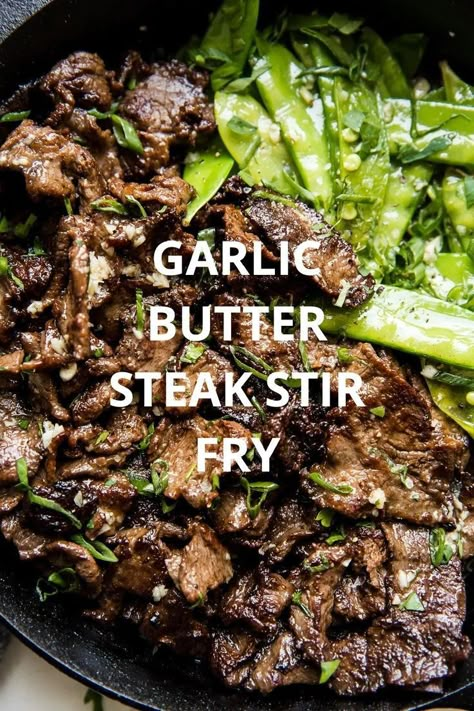 This steak stir-fry with a savory garlic-and-butter sauce feels indulgent, and is so easy to make. Served on its own or with rice, it’s the perfect quick weeknight dinner. #food #worksheets #kids Stir Fry With Snow Peas, Steak Stirfry Recipes, Stir Fry Meat, Strip Steak Recipe, Steak Stir Fry, Fried Steak Recipes, Steak And Rice, Easy Stir Fry Recipes, Beef Stir Fry Recipes