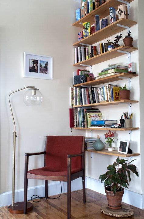 Small Apartment Bookshelf Ideas, Bookshelves In Corner, Corner Wall Bookshelves, Wall Of Floating Shelves, Floating Bookshelves Living Room, Corner Library Bookshelves, Wall Bookshelves Bedroom, Bookshelves Apartment, Floating Bookshelves Bedroom