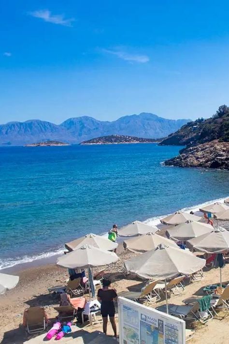 Looking for some of the best beaches in Crete?  Take a look at these beaches in Agios Nikolaos, Crete! From the stunning Almiros to the family-friendly Ammoudi Beach, these are some of the most beautiful beaches in Crete.  Take a look! CreteBeaches ;GreeceBucketList; best places to visit in Crete Agios Nikolaos Crete, Beaches In Greece, Beaches To Visit, Bus Route, Free City, Crete Greece, Palace Hotel, Beach Signs, Beautiful Villages