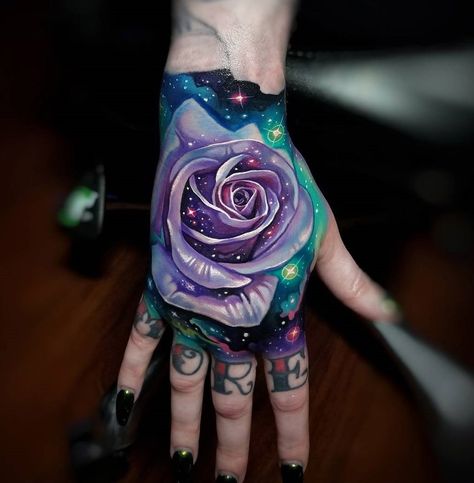 Hand rose, back of girls hand Rose Hand Tattoos, Purple Rose Tattoos, Cosmic Tattoo, Le Tattoo, Galaxy Rose, Rose Hand Tattoo, Bright Tattoos, Galaxy Tattoo, Forarm Tattoos