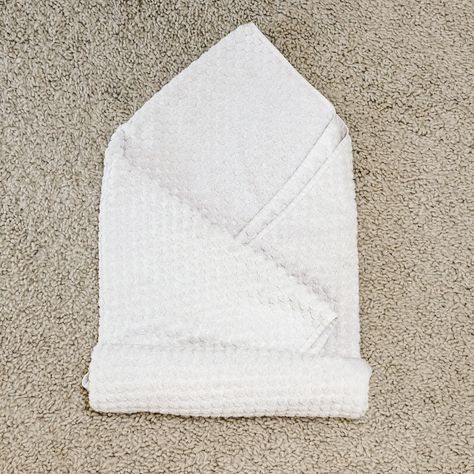 How to Roll a Spa Towel How To Roll Hand Towels Bathroom, Spa Towel Folding, Rolled Towels Bathroom, Fold Towels Like Hotel, Folding Bath Towels, Hand Towel Folding, How To Roll Bath Towels, Fold Hand Towels, Fancy Towels