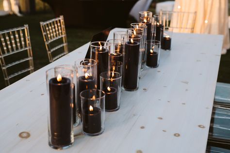 Black Candles Table Setting, Black Led Candles Wedding, Tall And Short Candle Centerpieces, Black Candle Centerpieces Round Table, Moody Wedding Candles, Black Candles Centerpieces, Black Candle Tablescape, Black Floating Candle Centerpieces, Black Candles Wedding Table