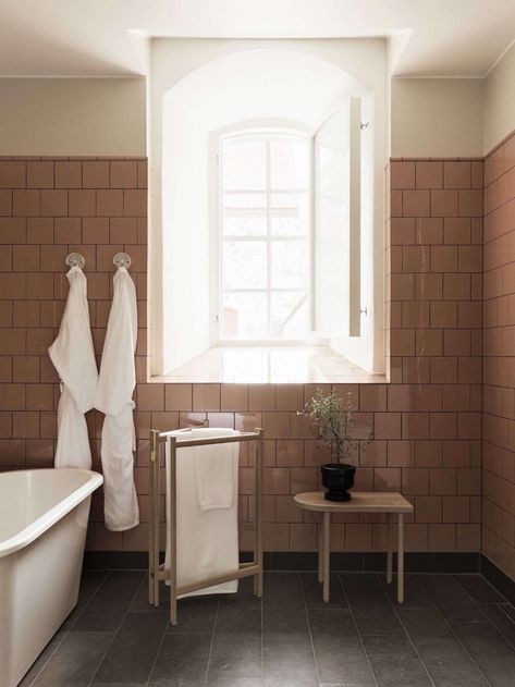 Trending on Remodelista: Artful Color Palettes - Gardenista Swedish Bathroom, Modern Pink Bathroom, Wooden Clothes Drying Rack, Scandinavian Bathroom, Pink Tiles, Slate Flooring, Retro Interior, Pink Bathroom, Bath Room