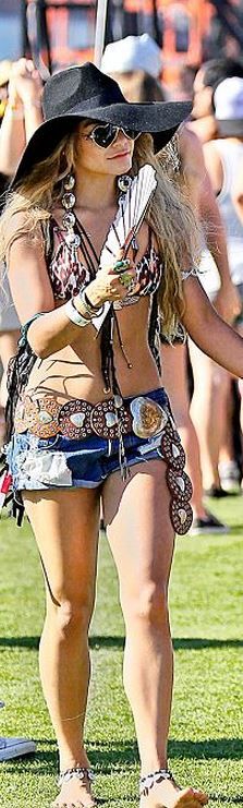 Blue denim shorts and leopard bikini top Bohemian Festival Mini Hat, Coachella Outfit Vanessa Hudgens, High-rise Denim Shorts For Festival, Coachella Accessories, Bohemian Summer Festival T-shirt, Vanessa Hudgens Coachella, Coachella Fashion Vanessa Hudgens, Vanessa Hudgens And Austin Butler, Coachella 2014