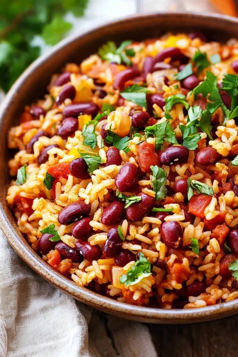 Spanish Rice and Beans Spanish Brown Rice Recipes, Dominican Rice And Beans, Beans And Rice Recipes, Spanish Rice And Beans, Sazon Seasoning, Spanish Rice Recipe, Fluffy Rice, Adobo Seasoning, Spanish Recipes