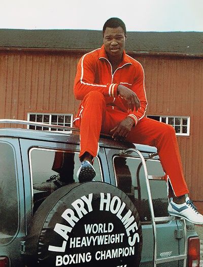 Larry Holmes - World Heavyweight Champion Boxer Aesthetic, Larry Holmes, Vintage Racing Poster, Boxing History, Boxing Champions, Sport Inspiration, Racing Posters, Combat Sport, Sports Figures