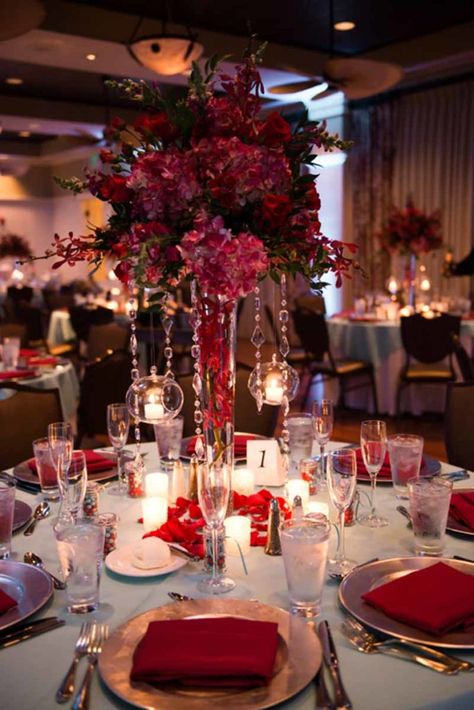 Red Tall Floral Centerpieces - Celebration Florida - Tiffany and Burgundy Wedding - Central Florida Wedding Venue - Photographer: Jamie Reinhart Photography - Bohemian Celebration - click pin for more - www.orangeblossombride.com Quince Decorations Red, Blue And Burgundy Wedding, Tall Floral Centerpieces, Pink Pelican, Centerpieces Quinceanera, Wedding Planning Notebook, Celebration Florida, Planning Notebook, Wedding Knot