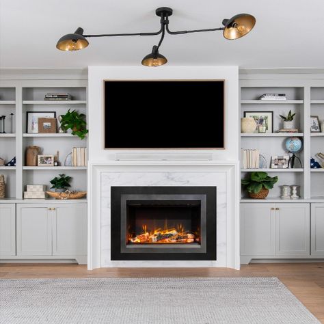 Whether you are upgrading an existing space or starting a new build, the Valor™ GE4 electric fireplace is the perfect solution. The GE4 offers a large viewing area with Valor-designed birch, driftwood, and splitwood log sets. It's a flexible alternative to gas or wood but only requires a simple plug-in installation to start heating your space. The GE4 can also be hard-wired if required. Fireplace Showroom, Fireplace Video, Fireplace Safety, Media Fireplace, Fireplace Heat, Gas Insert, Gas Stove Top, Outdoor Gas Fireplace, Freestanding Fireplace