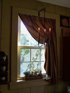 Love this idea of the candle holder hanging in front of the window. Description from pinterest.com. I searched for this on bing.com/images Primitive Window Treatments, Primitive Windows, Primitive Curtains, Artisan Kitchen, Primitive Bedroom, Primitive Lighting, Primative Decor, Primitive Homes, Country Curtains