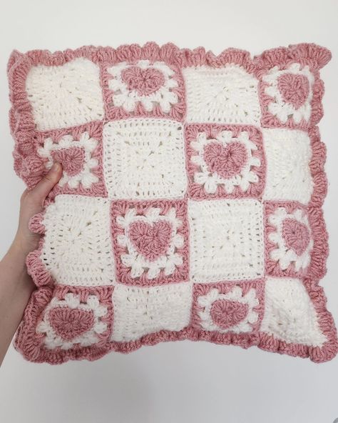 Heart granny square pillow 🩷◻️ and another pillow done!!! ✨️ . . . My cats are photobombing 90% of my photos 😿🫶 . . . . . #crochetpillow #handmadepillow #crochetdecor #pinkandwhite #crochetlove #crochetaddict #crochetdesign #crochetinspiration #crochetcreations #crochetartist #crochetproject #crochetpattern #crochetlife #crochetlovers #crochetfun #crochetcraft #crochetart #crochetcommunity #crochettherapy #crochetobsessed #pink #white #crochet #pillow #handmade #pillowcase #pinkandwhite Crochet Pillow Cover Granny Square, Heart Granny Square Pattern, Pillowcase Crochet, Pink Granny Square, Granny Square Pillow, Heart Granny Square, Bow Pillows, Crochet Pillow Cover, Crochet Bows