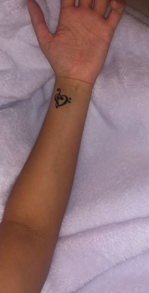 Music Notes On Wrist Tattoo, Music Note Tattoo On Hand, Music Therapy Tattoo Designs, Music Tattoo Drawing, Heart And Music Tattoo, Tattoo Ideas Female Music, Music Note Heart Tattoo, Musical Tattoos For Women, Heart Music Tattoo