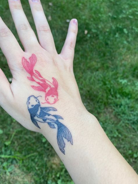 Red And Black Koi Tattoo, Koi Fish Tattoo On Hand, Koi Hand Tattoo, Red And Black Koi Fish Tattoo, Black And Red Koi Fish Tattoo, Colored Koi Fish Tattoo, Koi Fish Hand Tattoo, Fish Hand Tattoo, Red Koi Fish Tattoo