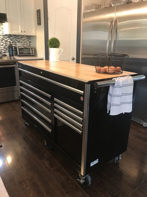 Kitchen island using a tool cabinet. Beautiful and versatile #island #kitchenisland #kitchenorganization #kitchenstorage Kitchen Island Tool Cabinet, Tool Cart Kitchen Island, Tool Storage Island, Snap On Tool Box Kitchen Island, Kitchen Island Tool Chest, Tool Box In Kitchen, Tool Bench Kitchen Island, Toolbox As Kitchen Island, Kitchen With Toolbox Cabinets